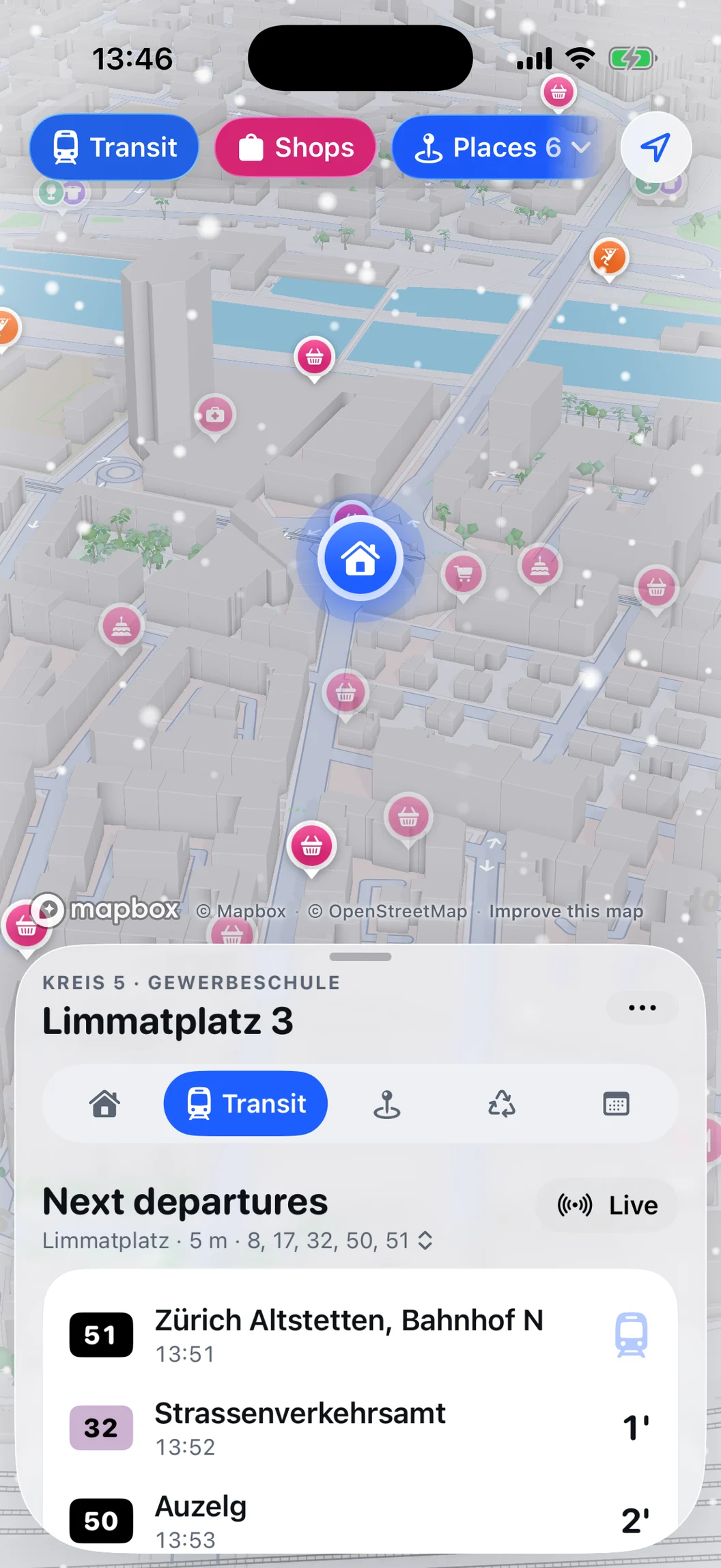 The same MiniZürich map view with snow falling